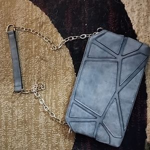Gray shoulder and wristlet purse .bg2